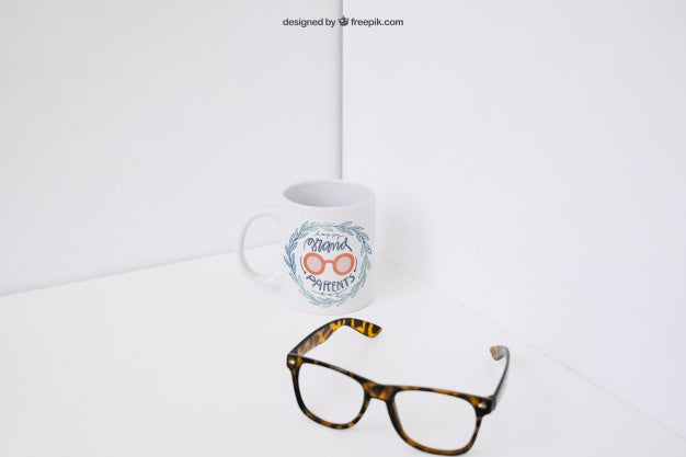Glasses In Front Of Coffee Mug Psd