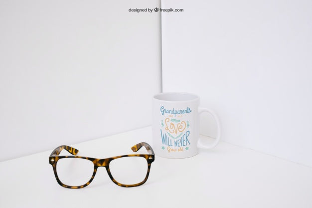 Glasses In Front Of Mug Psd