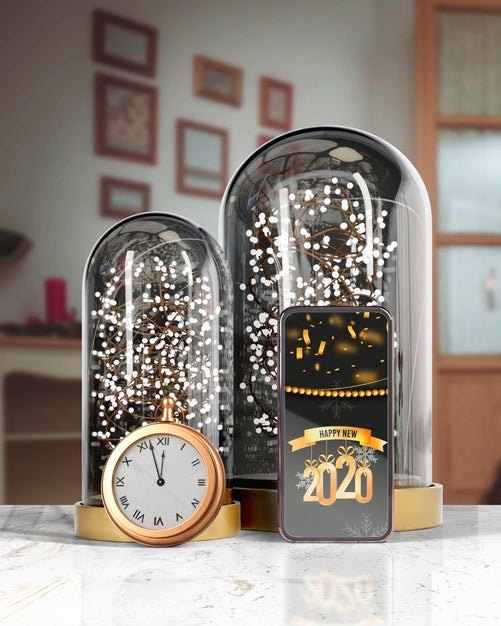 Globes Supporting Phone With Message For New Year Psd