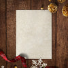 Gold Paper Mockup With Christmas Decorations On Wooden Background Psd