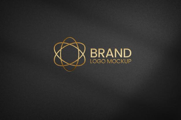 Golden Logo On Black Textured Paper Mockup Psd