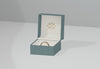 Green Jewelry Box With Golden Wedding Ring Psd