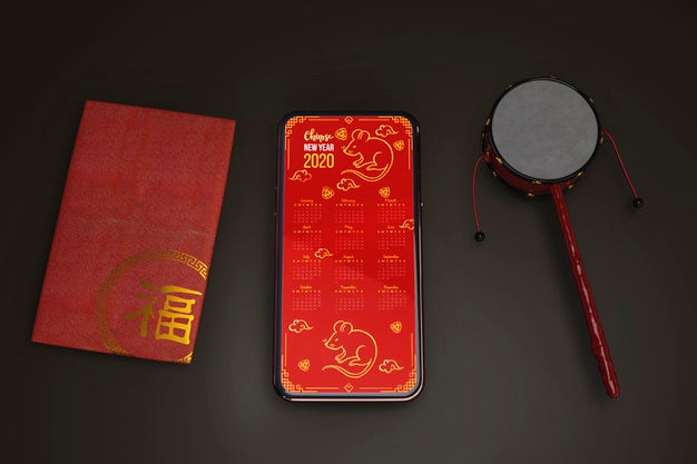 Greeting Card And Mobile On Table Psd