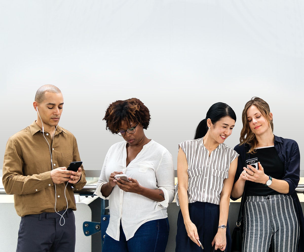 Group Of Diverse People Using Smartphones