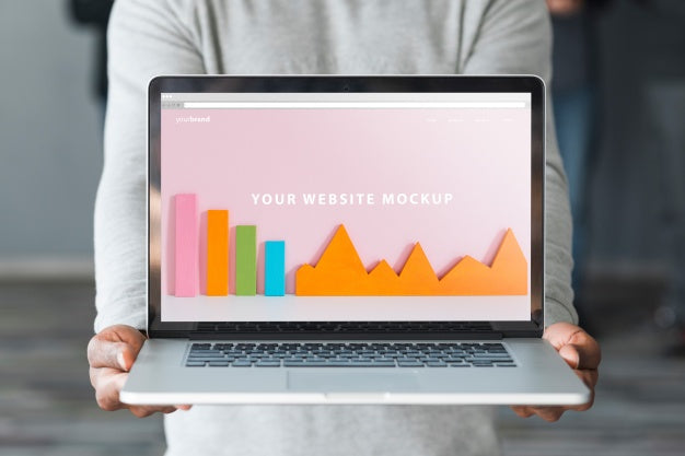 Group Of People Holding Laptop Mockup For Charity Psd