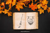 Halloween Mockup With Autumn Leaves And Book Psd