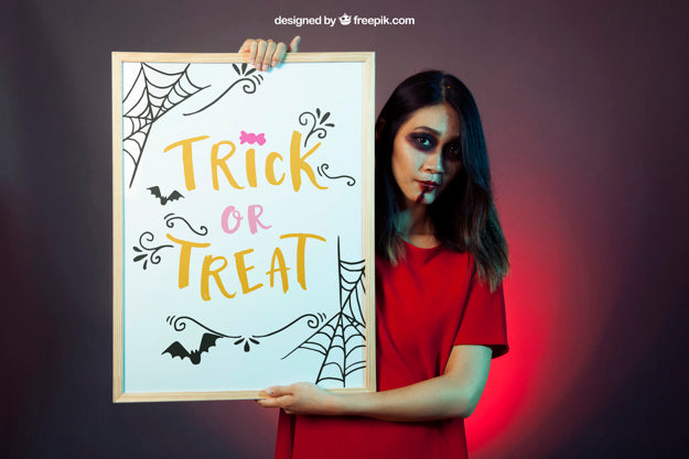 Halloween Mockup With Girl Holding Whiteboard Psd
