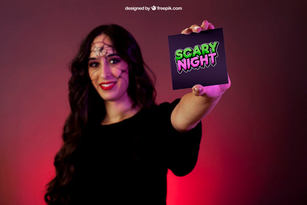Halloween Mockup With Girl Presenting Card Psd
