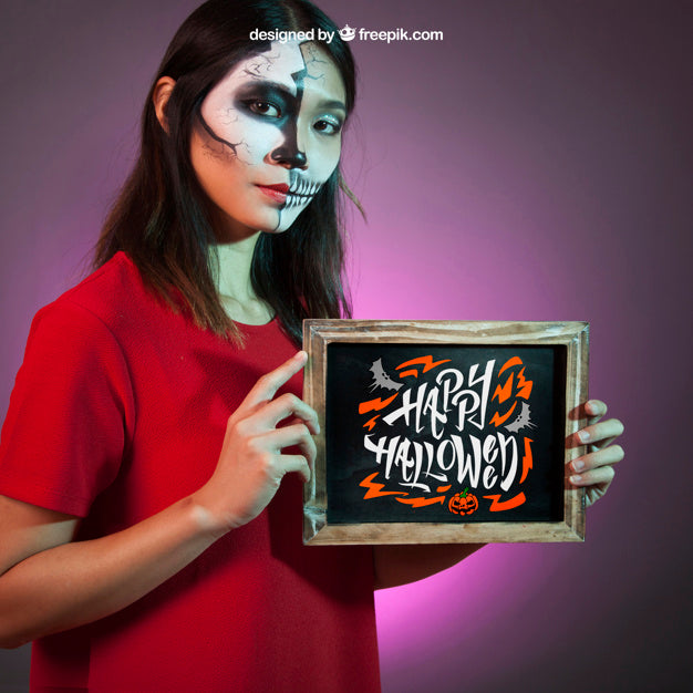 Halloween Mockup With Girl Presenting Slate Psd