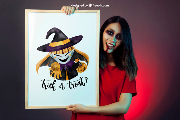 Halloween Mockup With Girl Showing Whiteboard Psd