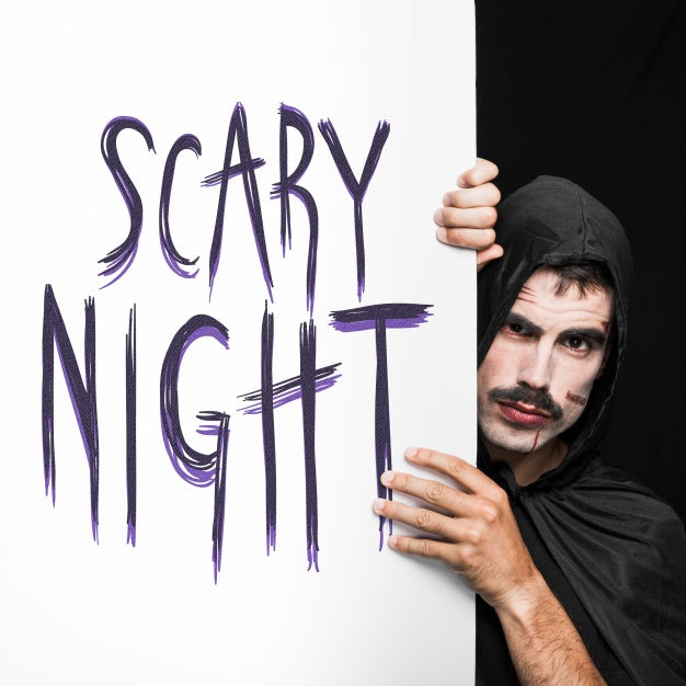 Halloween Mockup With Lettering On Big Board And Man Psd