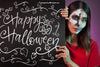 Halloween Mockup With Woman Behind Blackboard Psd