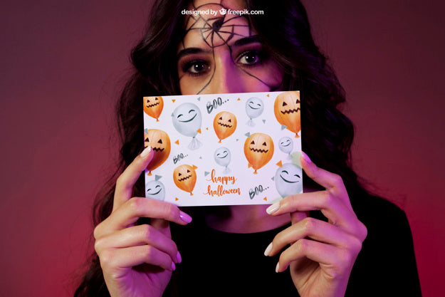 Halloween Mockup With Woman Holding Card Psd