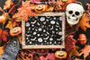 Halloween Slate Mockup With Skull And Tombstone On Leaves Psd