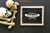 Halloween Slate Mockup With Two Skulls And Bones Psd