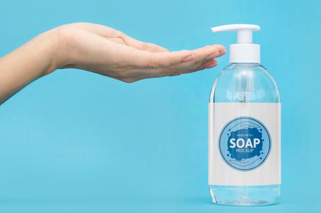 Hand Getting Liquid Soap From Bottle Psd