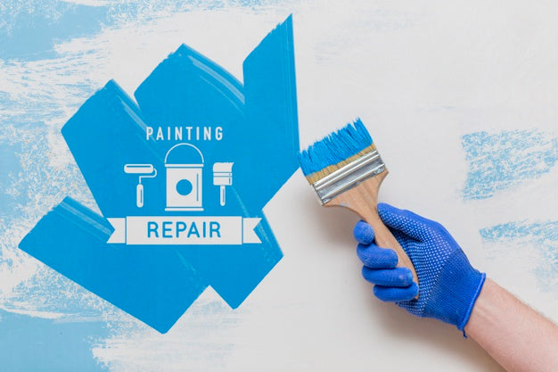 Hand Holding A Brush With Blue Colour Psd