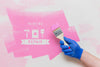 Hand Holding A Brush With Pink Colour Psd