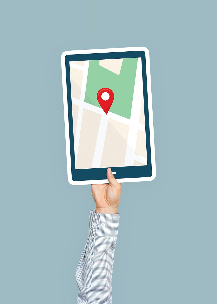 Hand Holding A Tablet With Gps