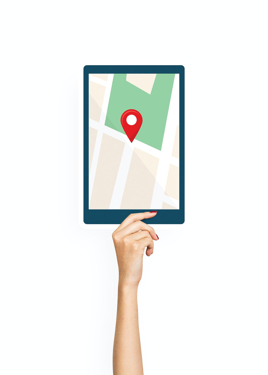 Hand Holding A Tablet With Gps
