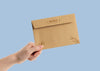 Hand Holding An Envelope Mock-Up Psd