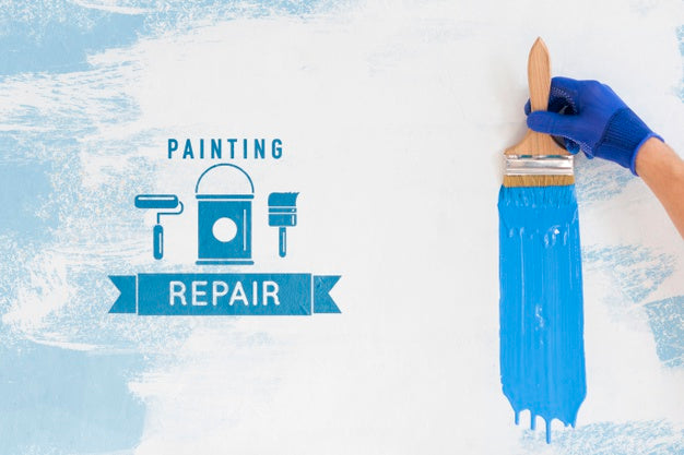 Hand Holding Brush With Blue Paint Mock-Up Psd