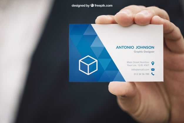 Hand Holding a Business Card Mockup