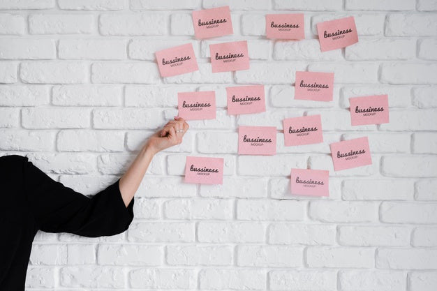 Hand Holding Business Sticky Note Psd