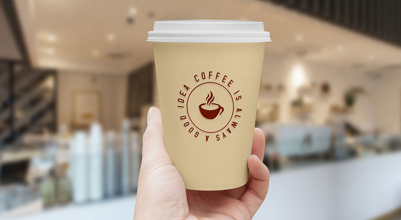 Hand Holding Coffee Cup Mockup Psd