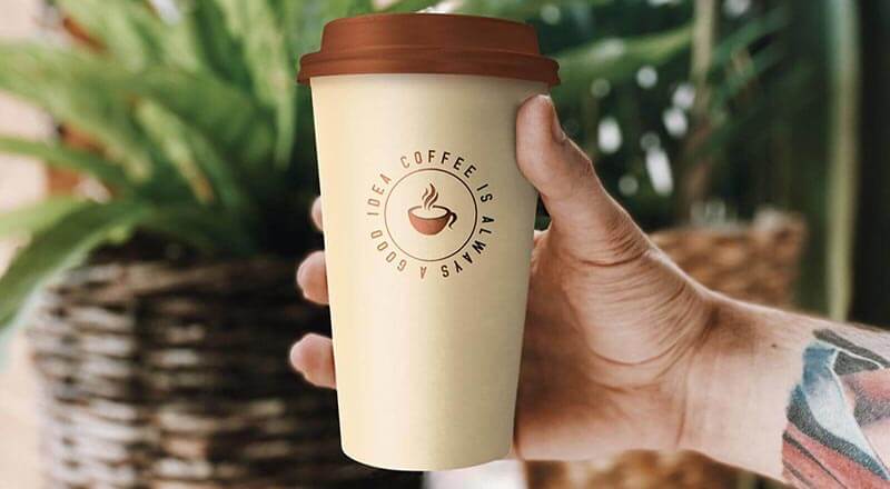 Hand Holding Coffee Cup Mockup Psd