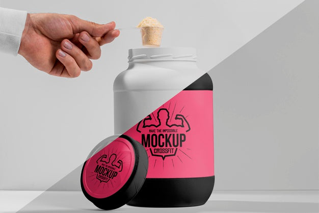 Hand Holding Fitness Spoon Filled With Protein Above Container Psd