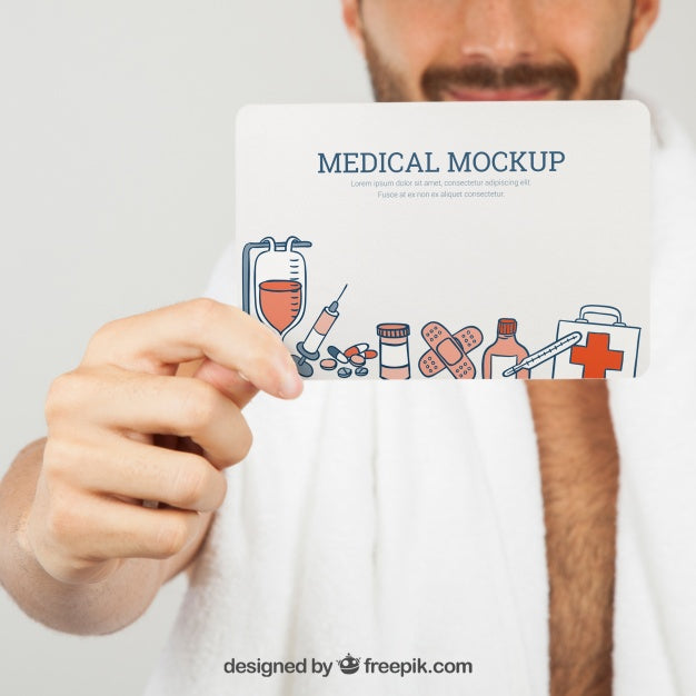 Hand Holding Medical Mock Up In Foreground Psd