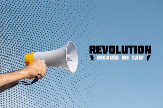 Hand Holding Megaphone In A Protest Psd