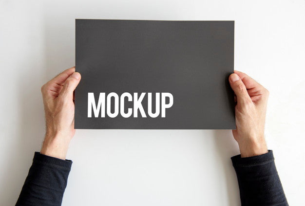 Hand Holding Paper Card Advertisement Psd