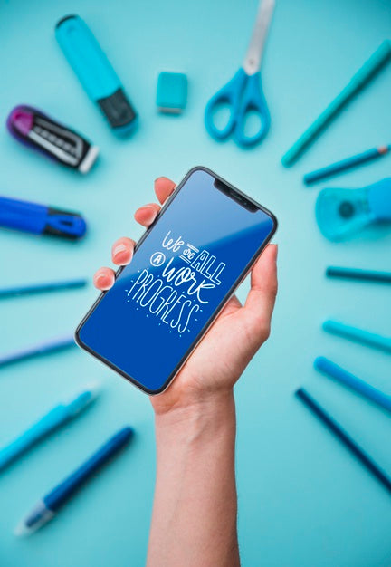 Hand Holding Phone With Tools Frame Psd