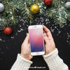 Hand Holding Smartphone Mockup With Christmas Design Psd