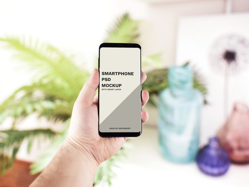 Hand Holding Smartphone Mockup