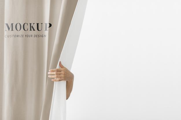 Hand Opening A Brown Curtain Mockup Psd