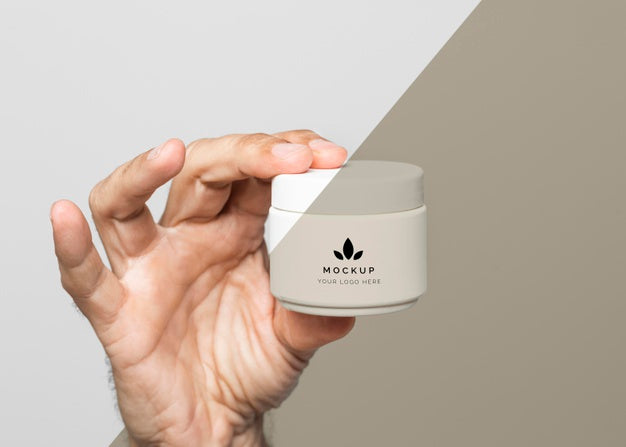 Hand With Cream Container Close Up Psd