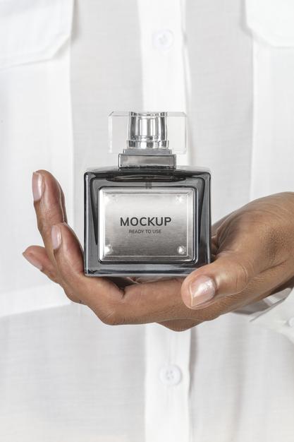 Hands Holding Blank Perfume Glass Bottle Mockup Psd