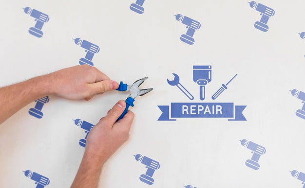 Hands Holding Scissors On Wall Psd