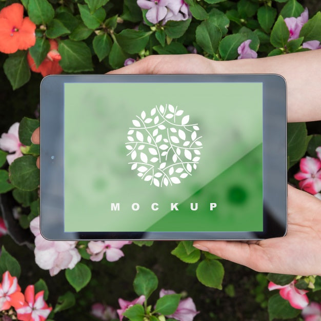 Hands Holding Tablet Mockup With Gardening Concept Psd