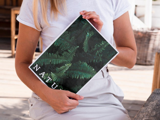Hands Showing A Nature Magazine Mock Up Psd