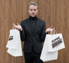 Handsome Man Holding Shopping Bags Psd