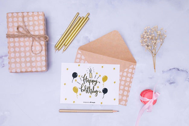 Happy Birthday Mock-Up With Dried Flower And Envelope Psd