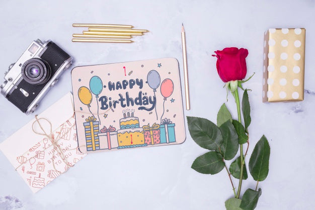 Happy Birthday Mock-Up With Rose And Retro Camera Psd