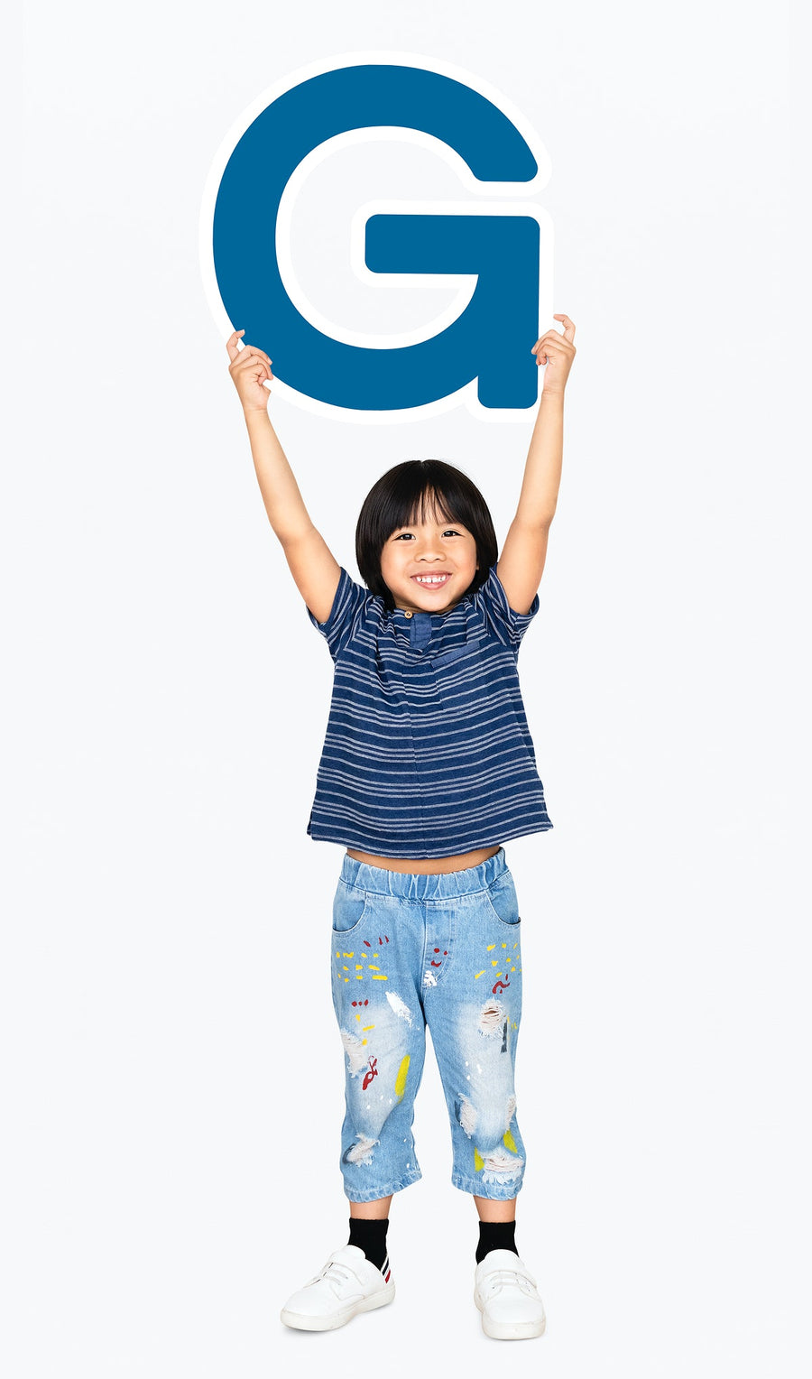 Happy Boy Holding The Letter G