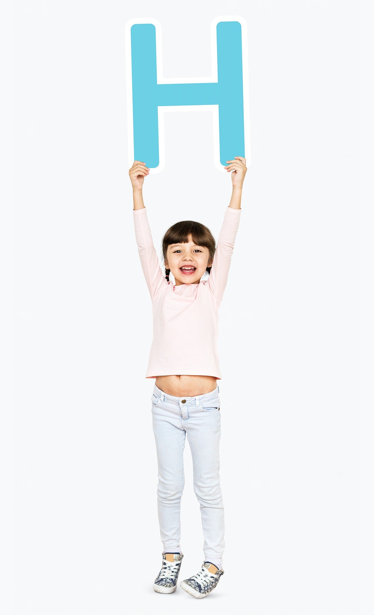 Happy Girl Holding The Letter H