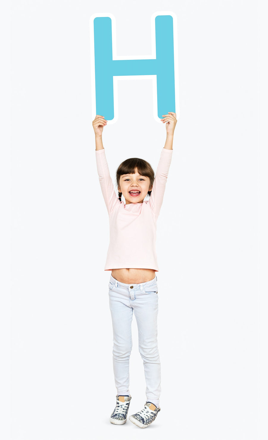 Happy Girl Holding The Letter H