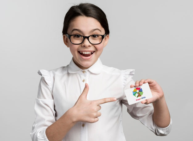 Happy Girl Pointing At Mock-Up Psd